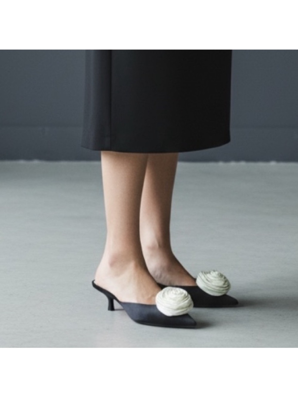 ANTONIO MELANI Black Pointed Mule Heels with Cream Rosette